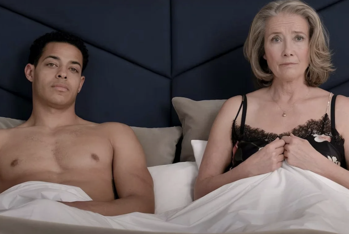 Young man and older woman in bed