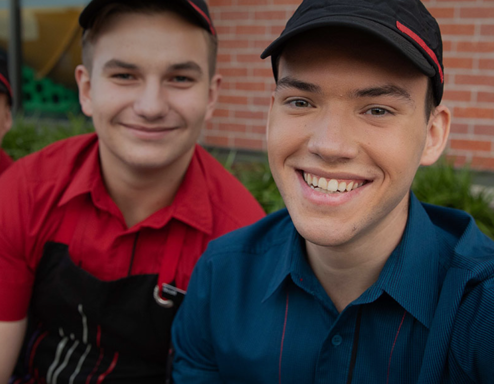 Young men in McDonald's uniforms