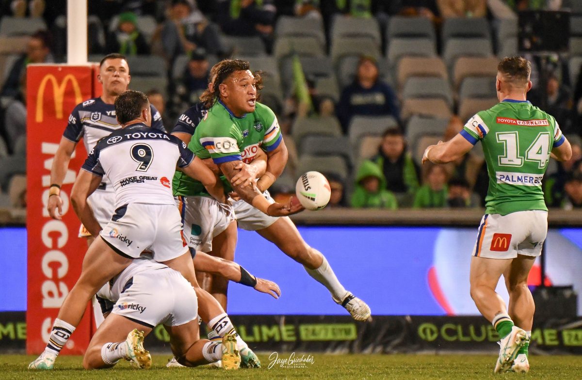 Papali'i manages a pass against a strong Cowboys defence. Photo: Jayze Photography.