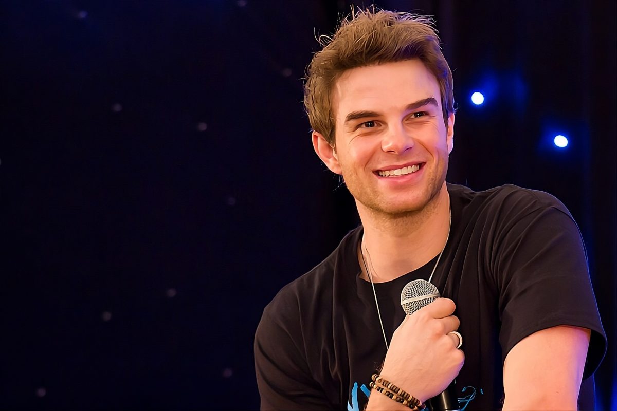 Nate Buzolic with microphone