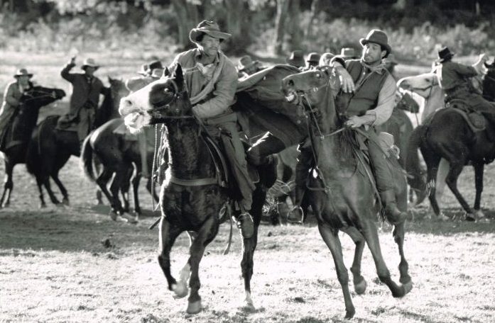 Ken Connley on horseback working as a stuntman.