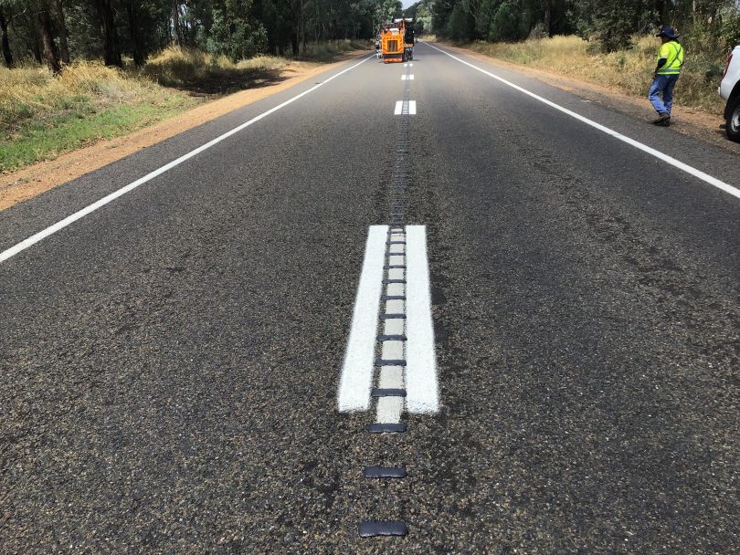 Rumble strips being placed on the Olympic Highway.