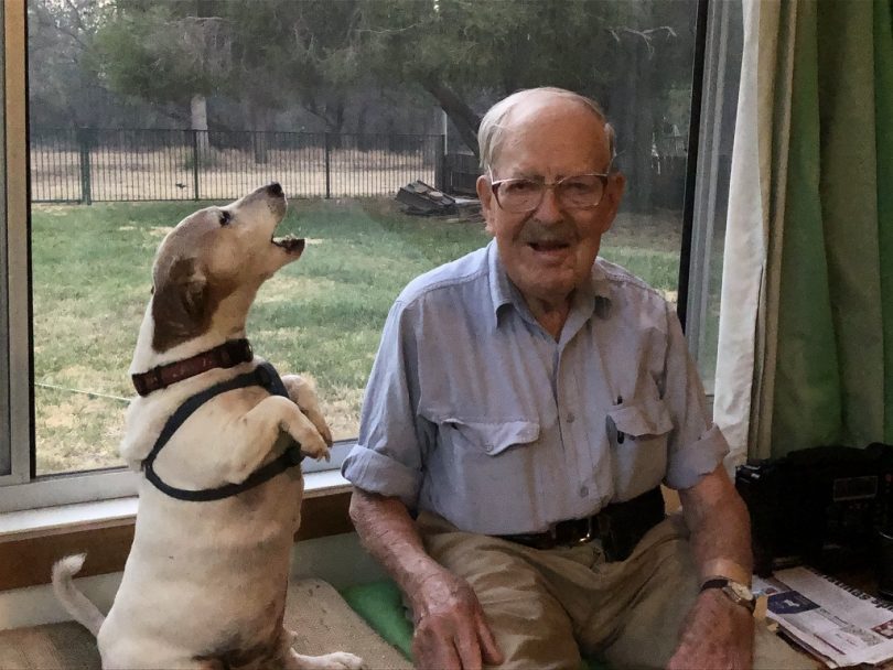 Elderly man and his dog
