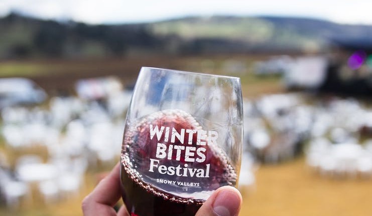 Wine glass with Winter Bites Festival logo