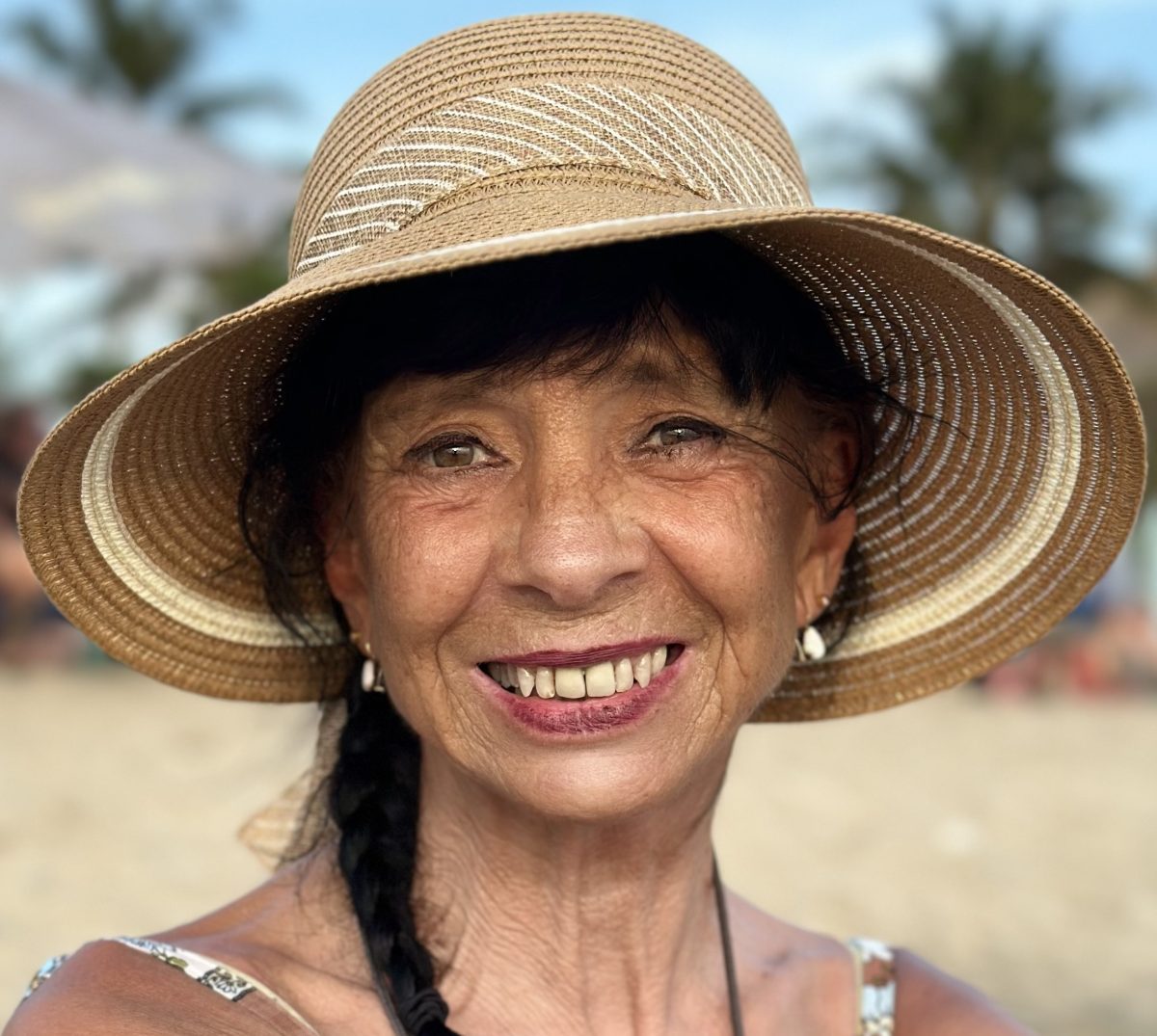 smiling woman wearing hat