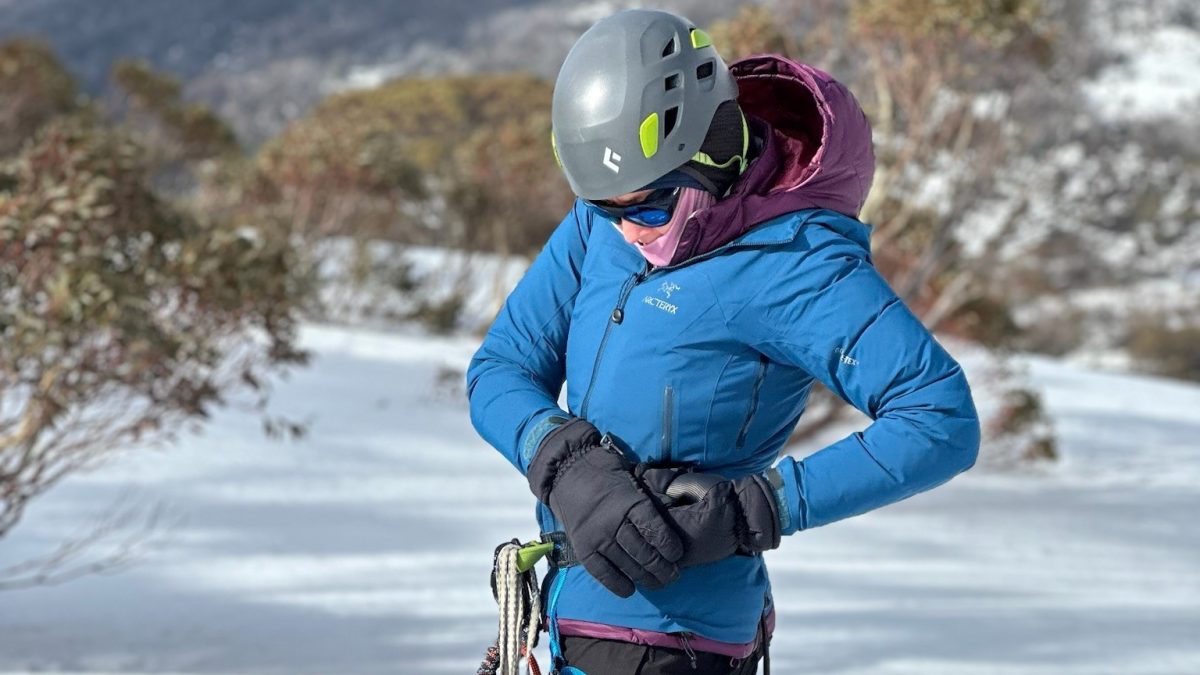 woman preparing to climb a mountain