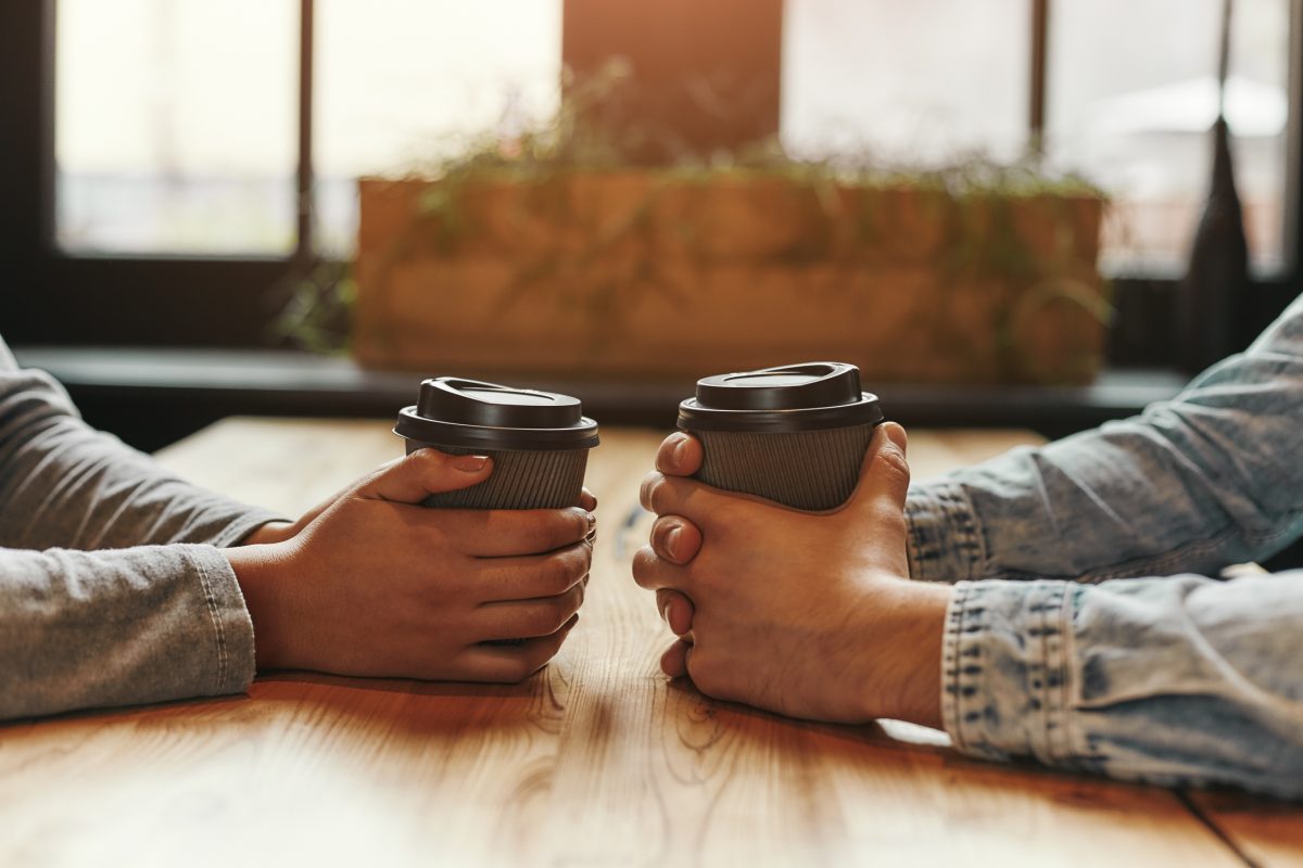 Hands holding coffees