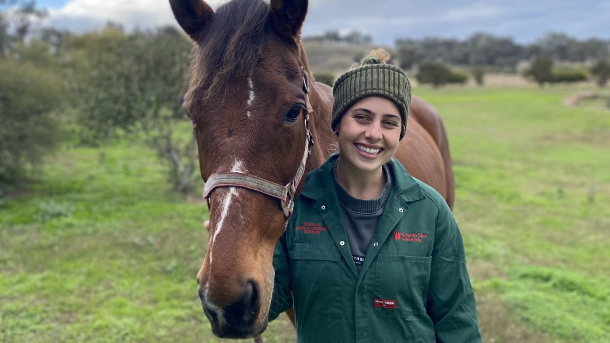 CSU student Mollie Buckley with a horse
