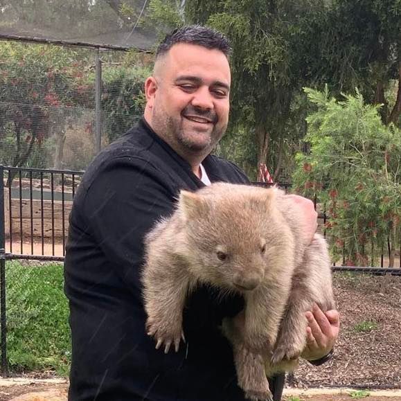 Man and wombat