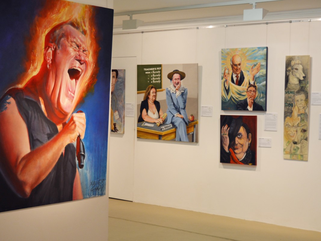 Satirical artworks in a gallery