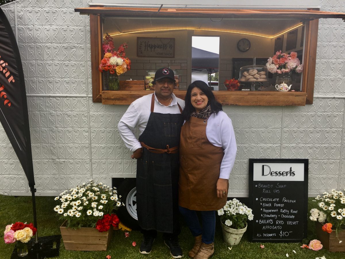 restaurateurs Shan and Dilini Jayawardene stand next to their food van