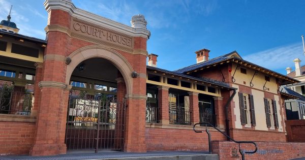 Two women charged over an alleged assault of three other women