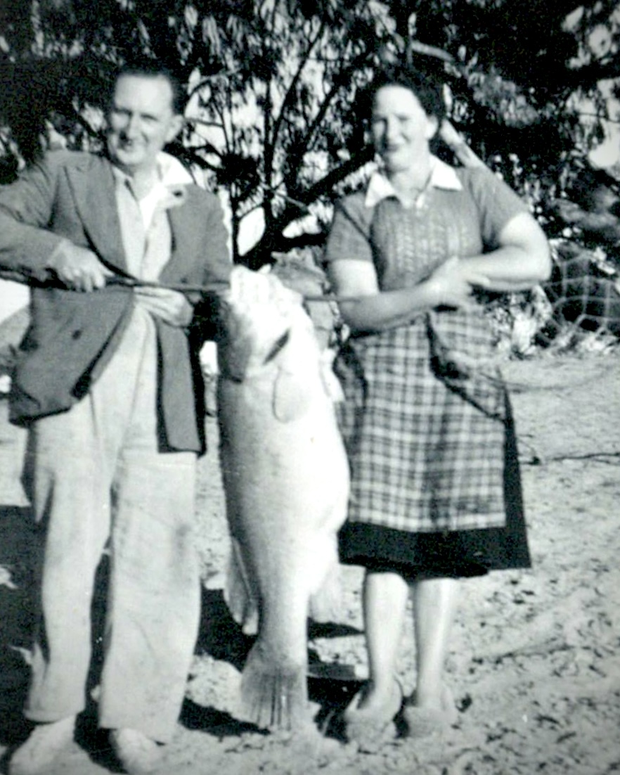 man and woman with fish