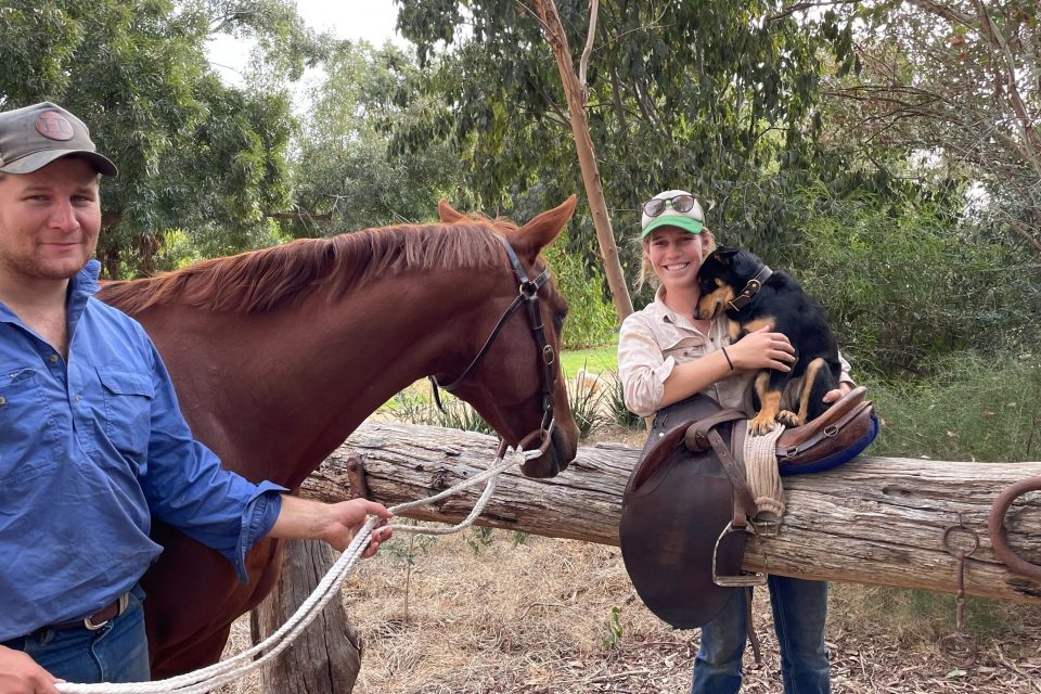 Riley leading Harry the stockhorse wearing his RG Leather bridle, and Grace with Peppa the kelpie, sporting her custom dog collar. Photo: RG Leather.