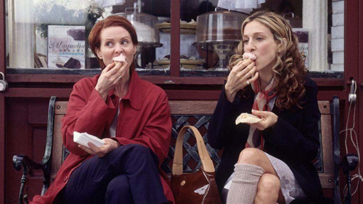 Carrie Bradshaw (Sarah Jessica Parker) and Samantha Jones (Kim Cattrall) talking crushes over cake at Magnolia Bakery in season 3 of the smash hit show. Despite the cupcakes only making a 30-second cameo, the sweet treat's popularity took off. Photo: HBO.