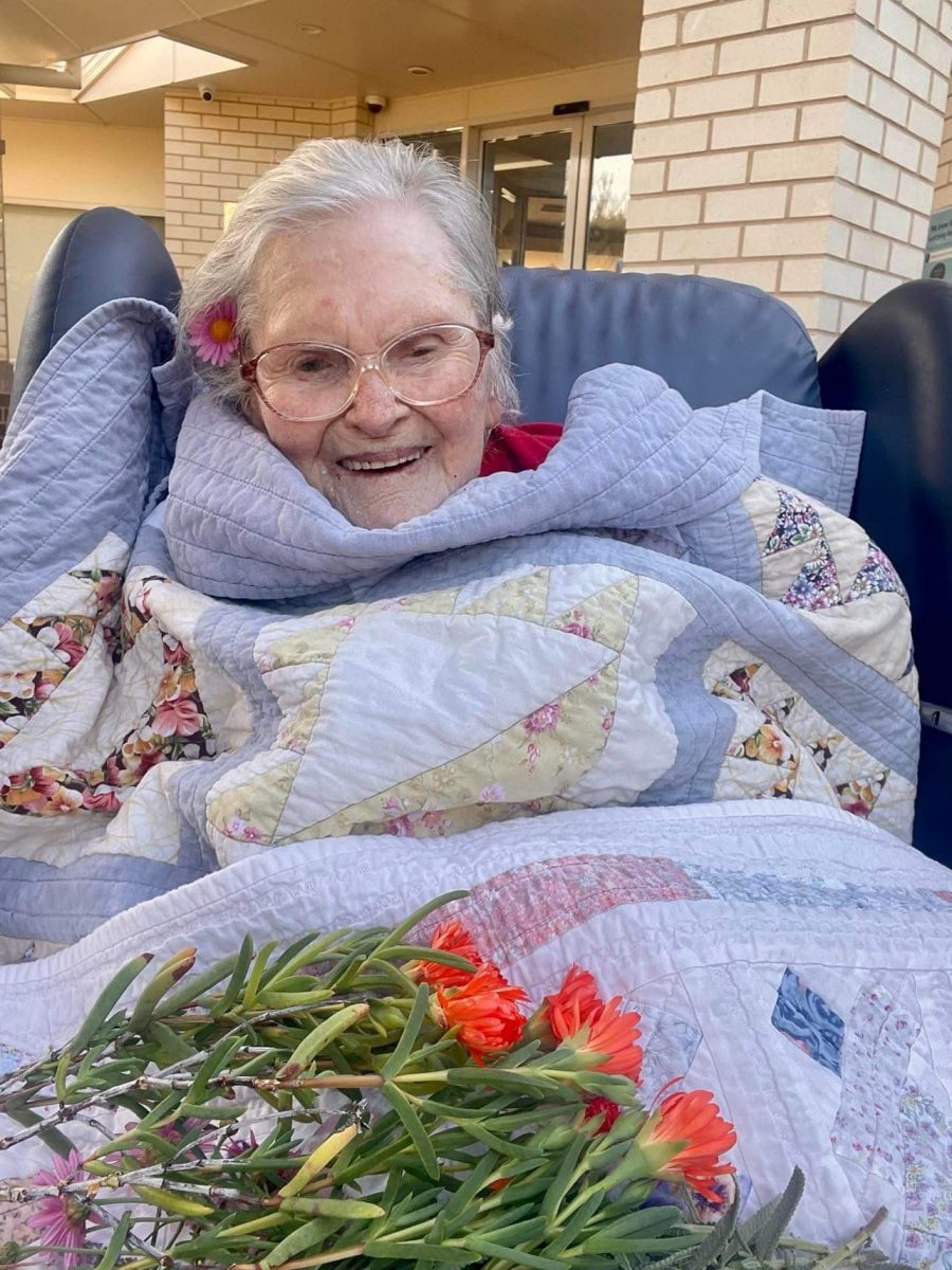 Woman in nursing home bed