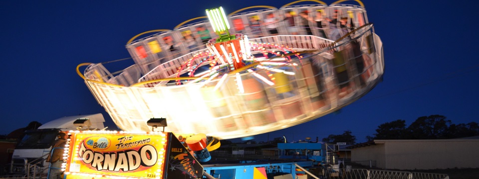 spinning lit-up fair ride