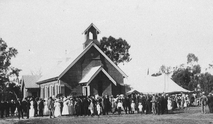 A crowd outside a church 