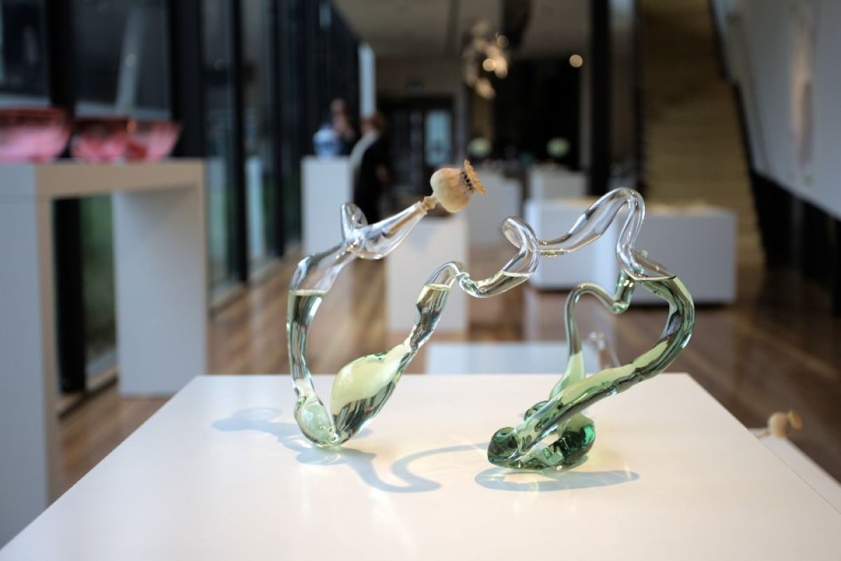 EXQUISITE: Shirley Wu, Meditation Forms, 2022. flameworked borosilicate glass, essential oil, poppy pod and silicone.
