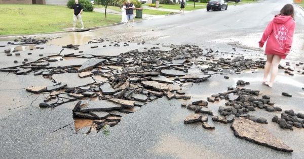 Whitewater and shattered streets as flash flooding hits Forest Hill