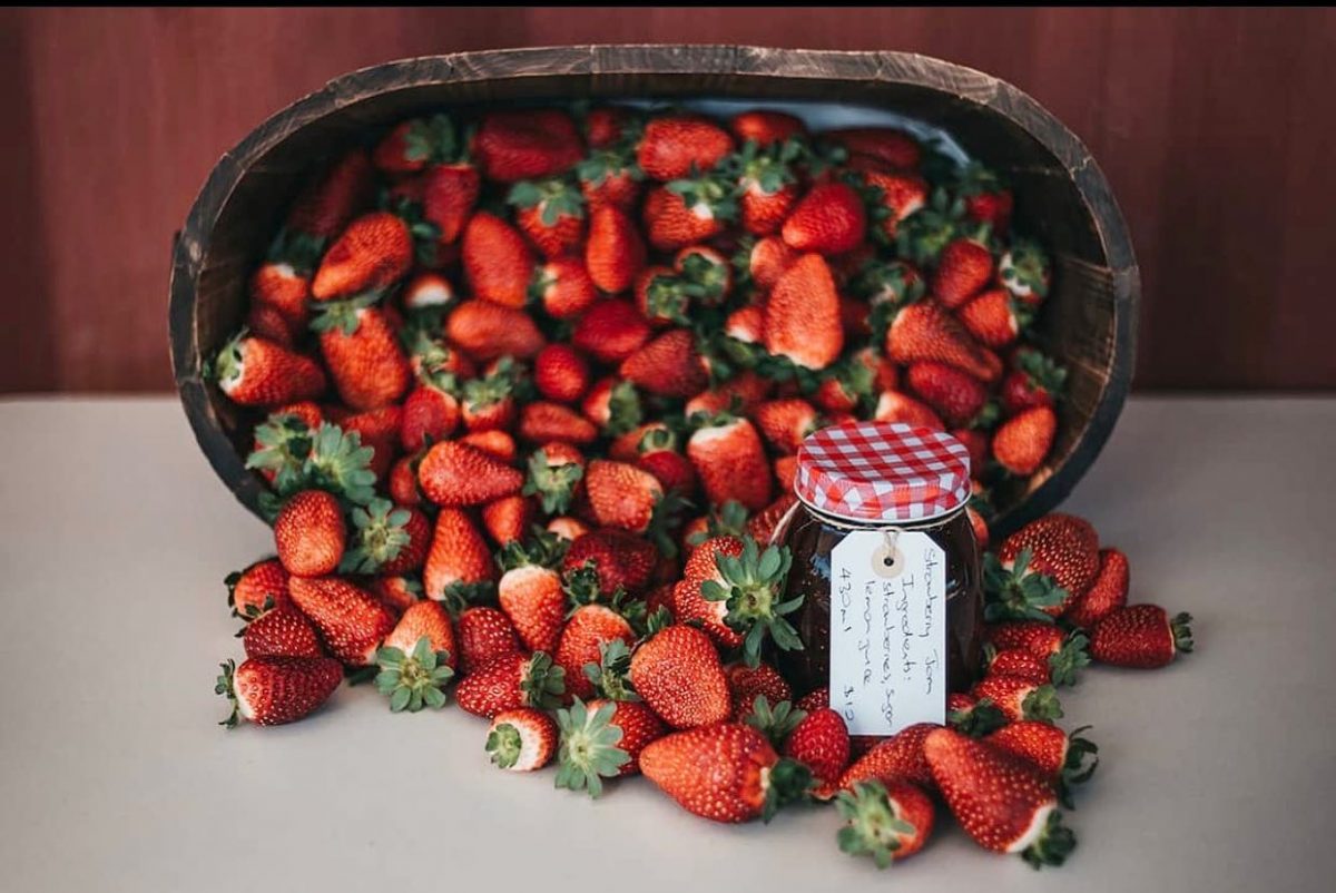 Strawberries spilling from a basket