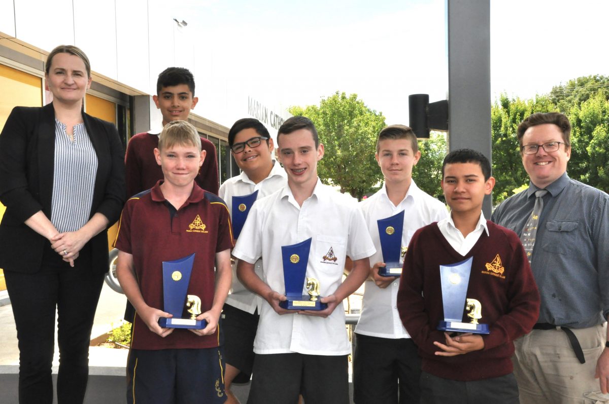 Students with trophies