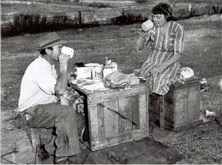 vintage photo of couple eating outdoors