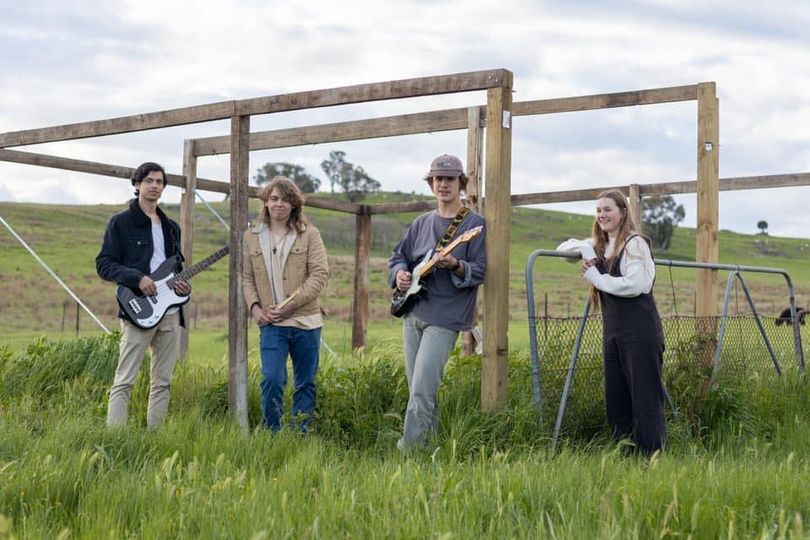 Wagga band Gone Fishin' standing in a field