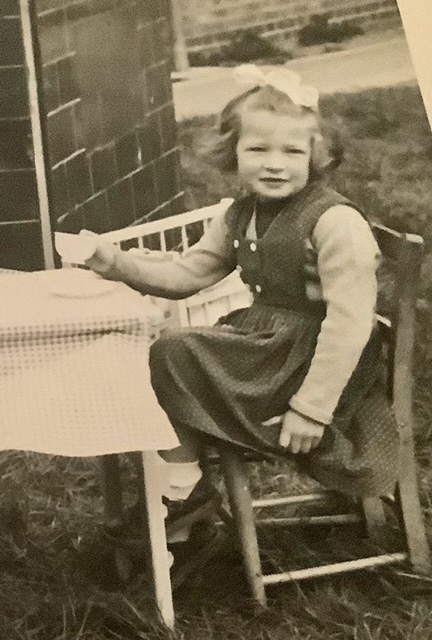 Black and white photo of young Sue