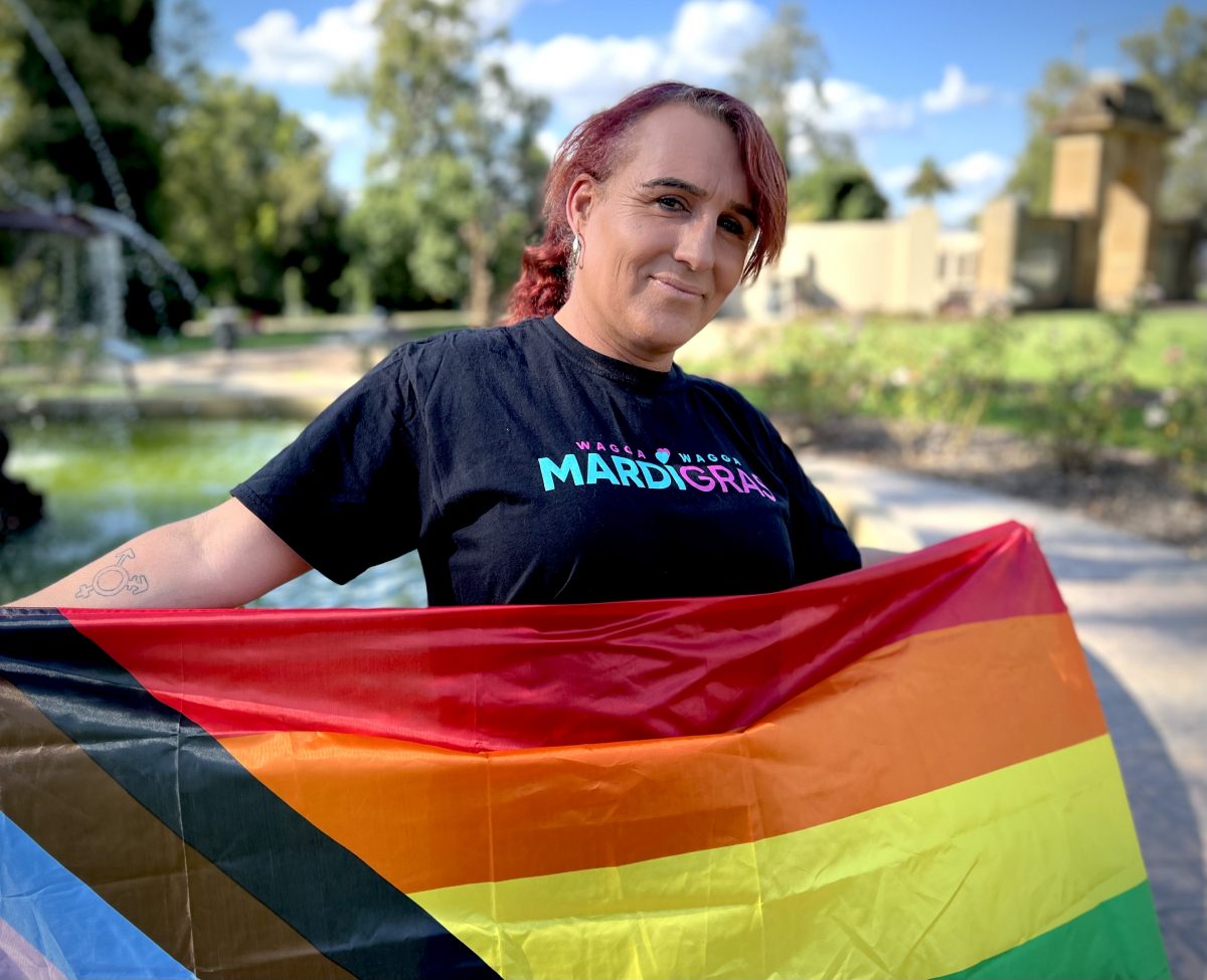 woman with rainbow flag