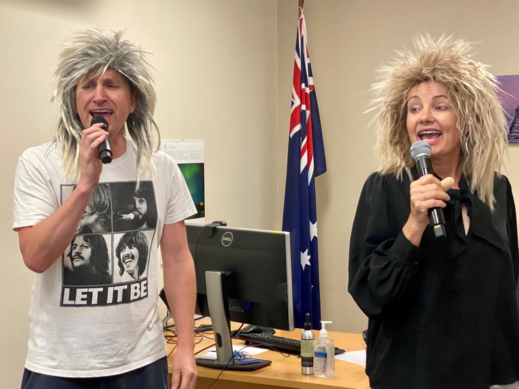 Glenn Starr and Sussan Ley in wigs singing
