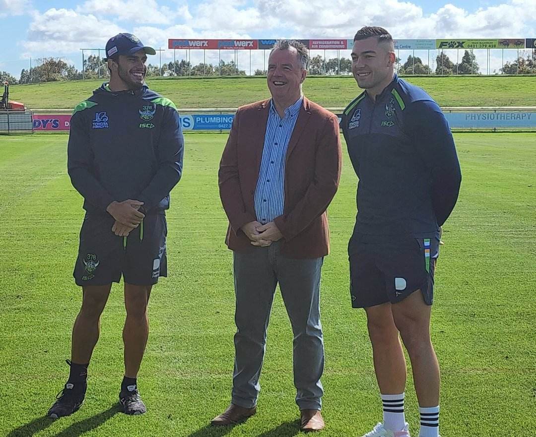 Canberra Raiders wingers Nick Cotric and Elijah Anderson with Wagga mayor Dallas Tout 