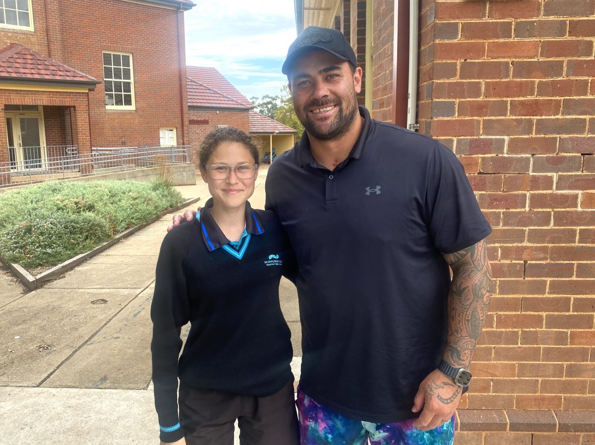 Andrew Fifita with arm around Elka Miller 