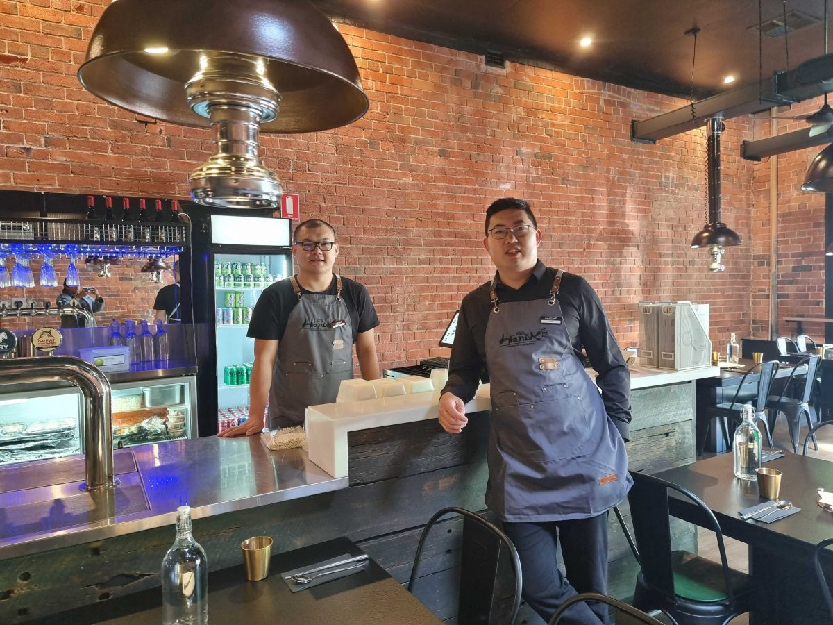 two men in restaurant