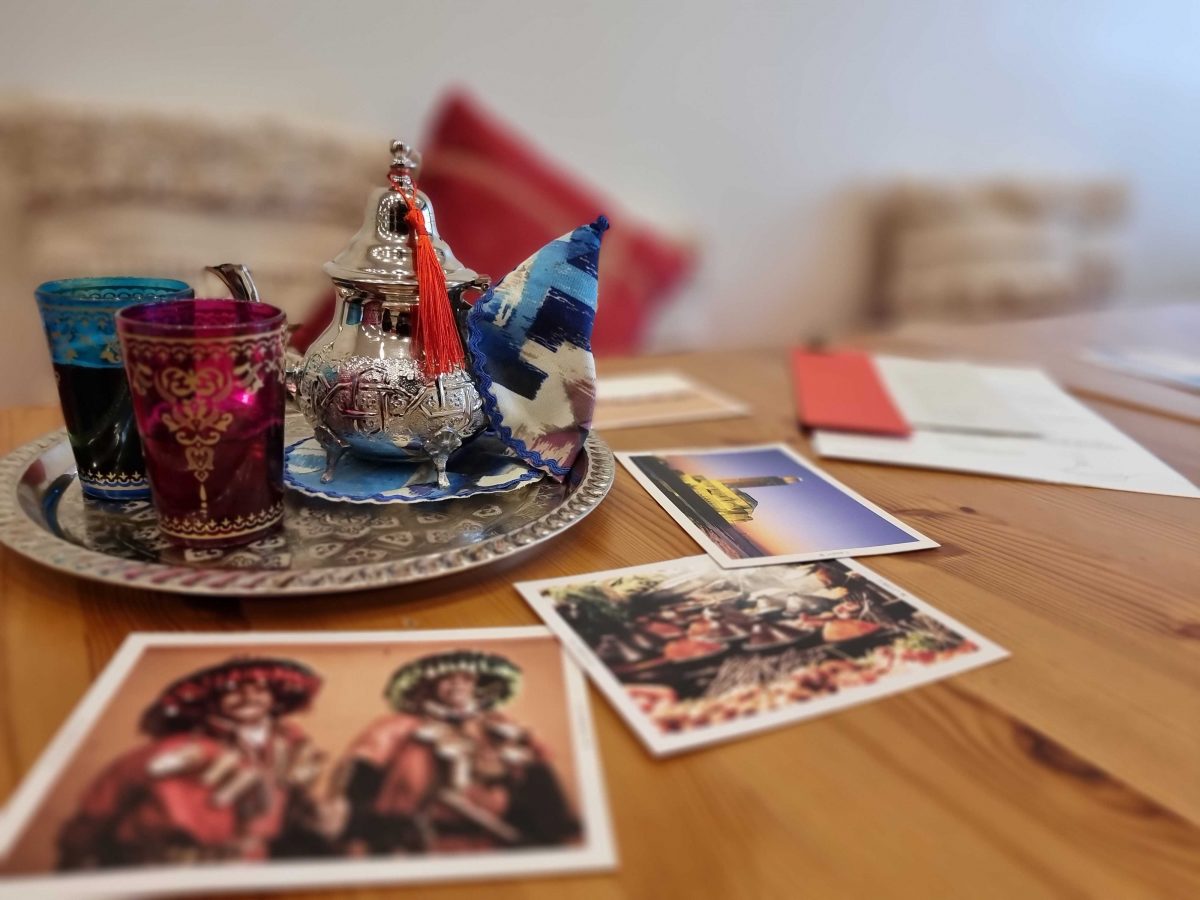 Teapot and postcards