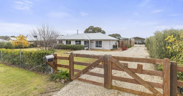 A new home with acreage that's an easy drive into town