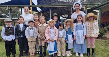 Students travel back in time to learn school's history