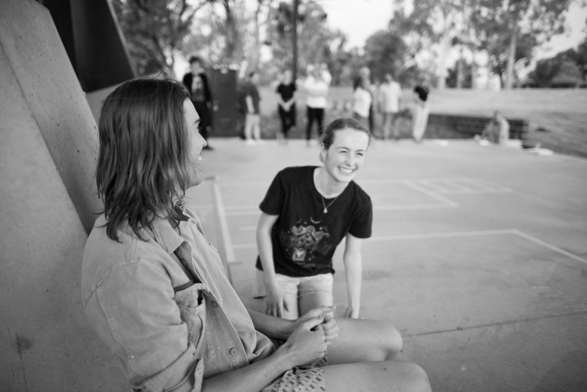 two actors outside during rehearsal