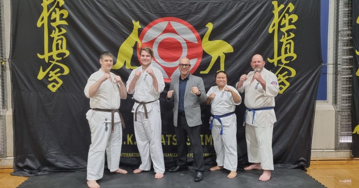 Frank Cirillo between four karate practitioners