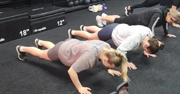 Gym team achieves 3144 push-ups each to raise funds for Lifeline