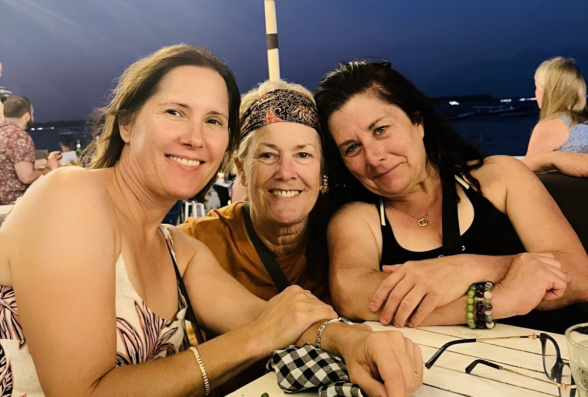 Three women at a dinner table in Bali 