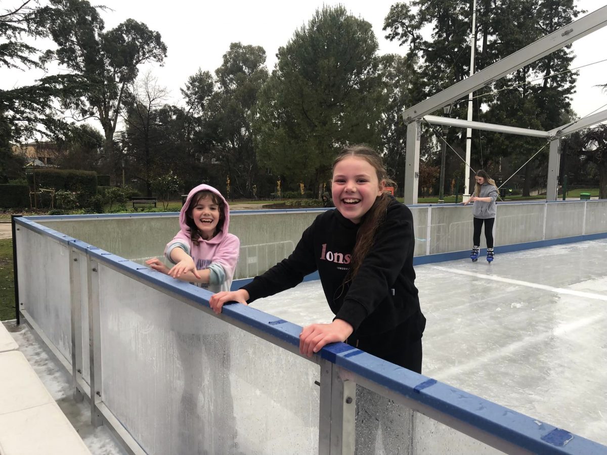 two girls ice-skating
