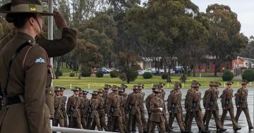 Showers fail to rain on parade with Indigenous army program recruits among Kapooka graduates