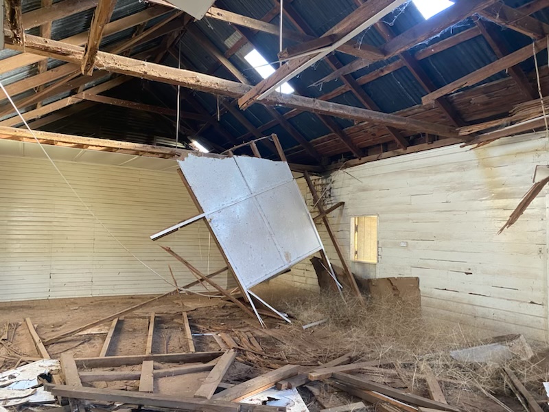 Damaged interior of shed