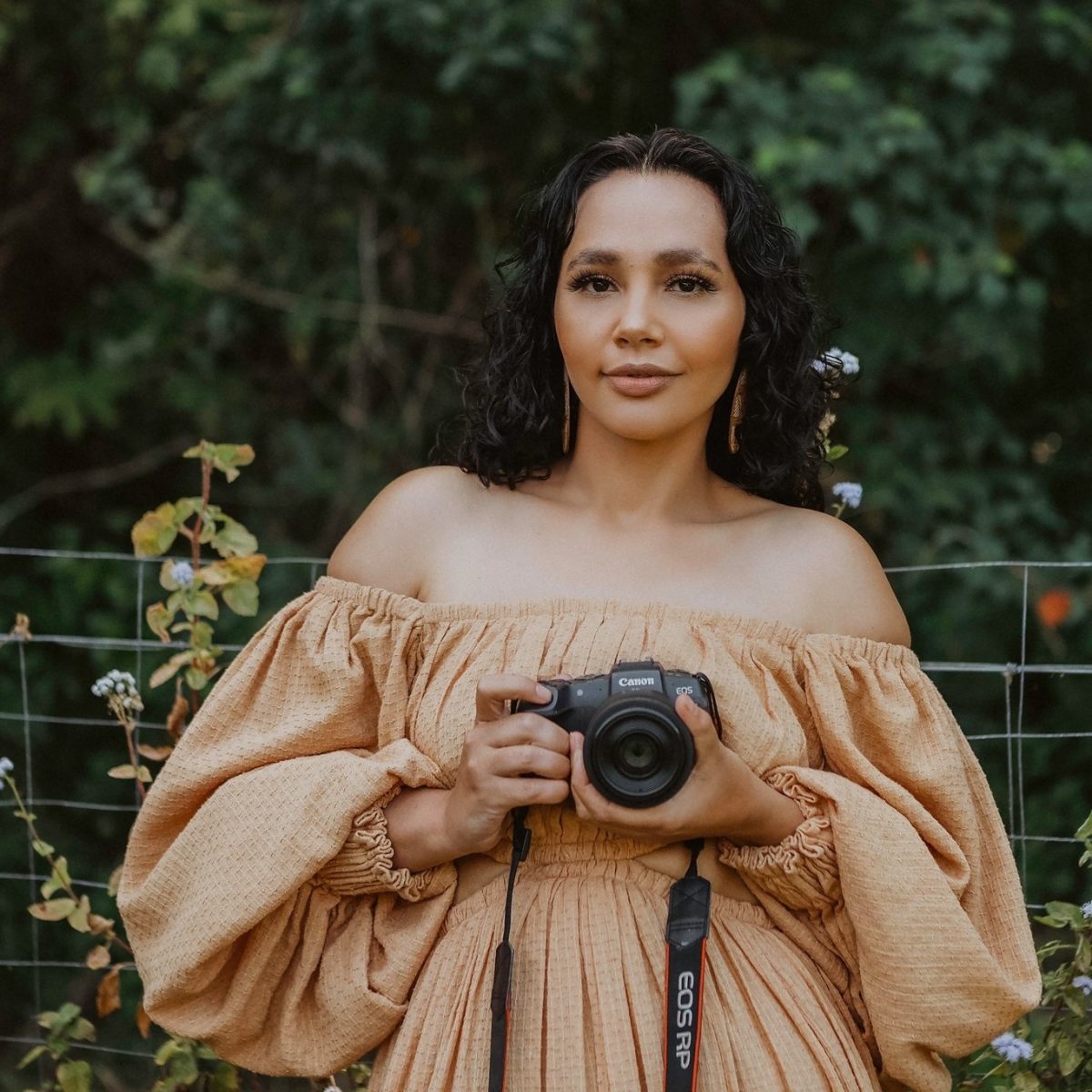 Marley Morgan holding a camera 