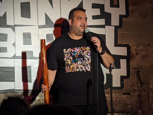 stand-up comedian performing on stage