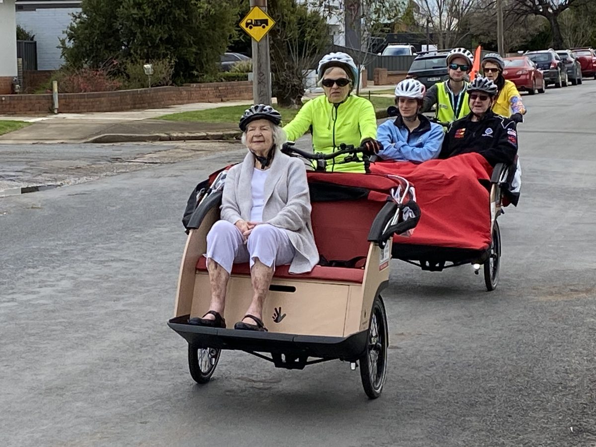 people in trishaws