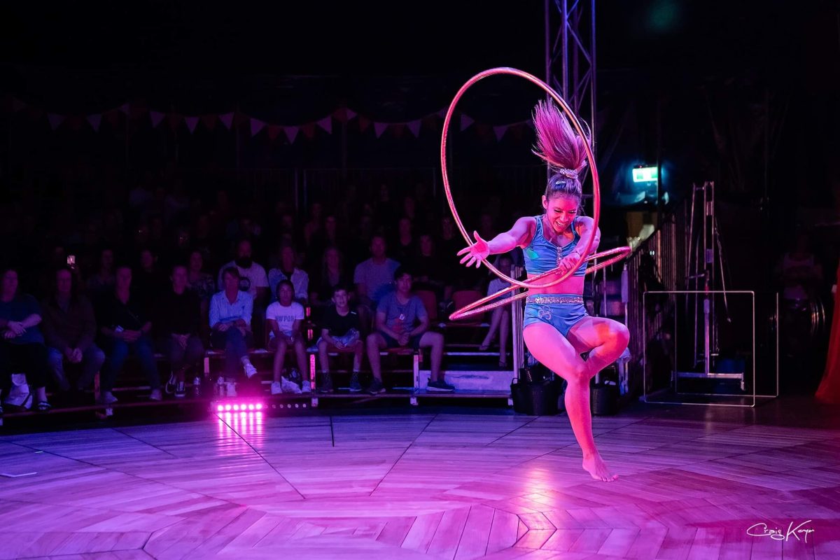 circus artist performing with hoops