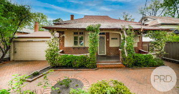 Room to move makes this red brick three–bedroom home a standout