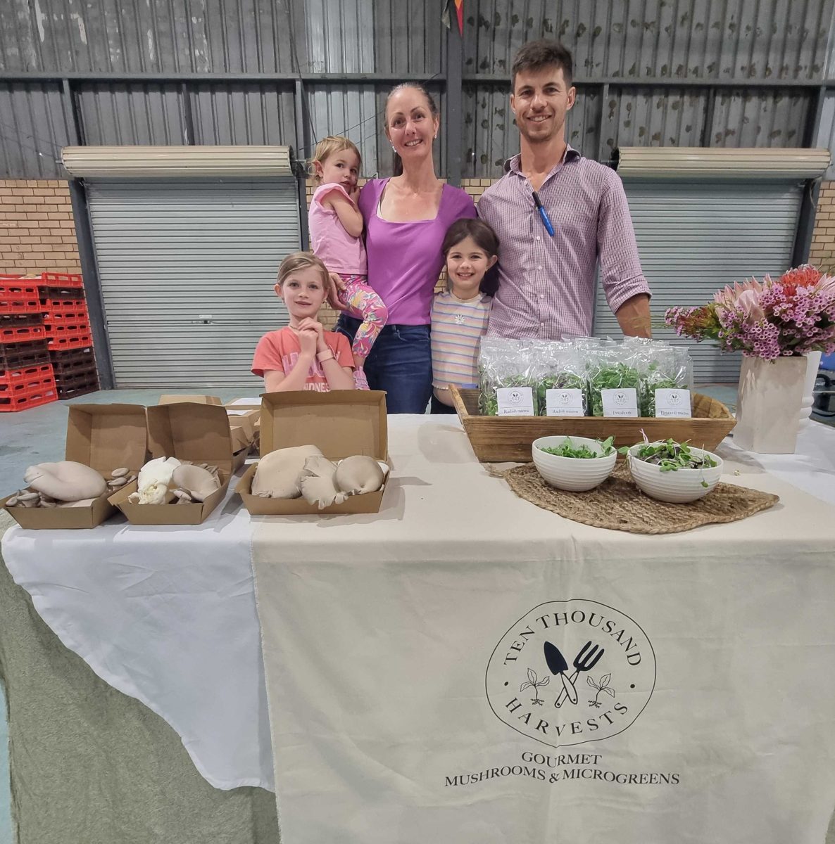 Family with their home-grown producers' market fare